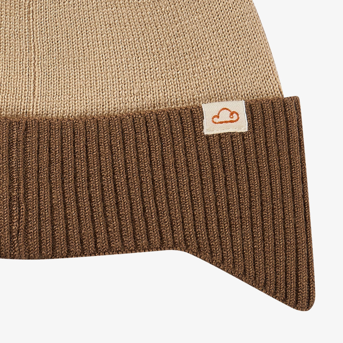 Petite Revery Tomato Beanie in Toast, folded ribbed brim detail