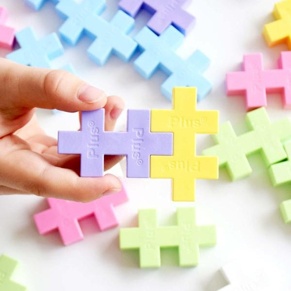 Plus-Plus Big Pastel Mix 100-piece building toy set featuring pastel cross blocks in assorted colors