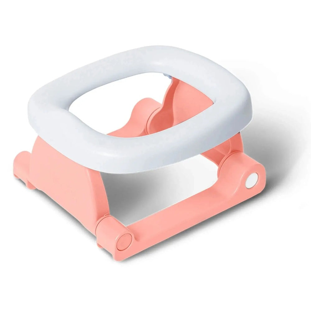 Pottiagogo Potty Training Travel Potty pink frame with white seat, compact foldable design for on-the-go use.