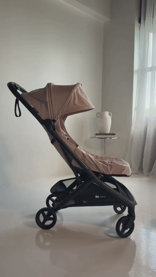 Bugaboo Butterfly 2 Plus Lightweight Travel Stroller — Foot cover storage tutorial; accessories shown may be sold separately