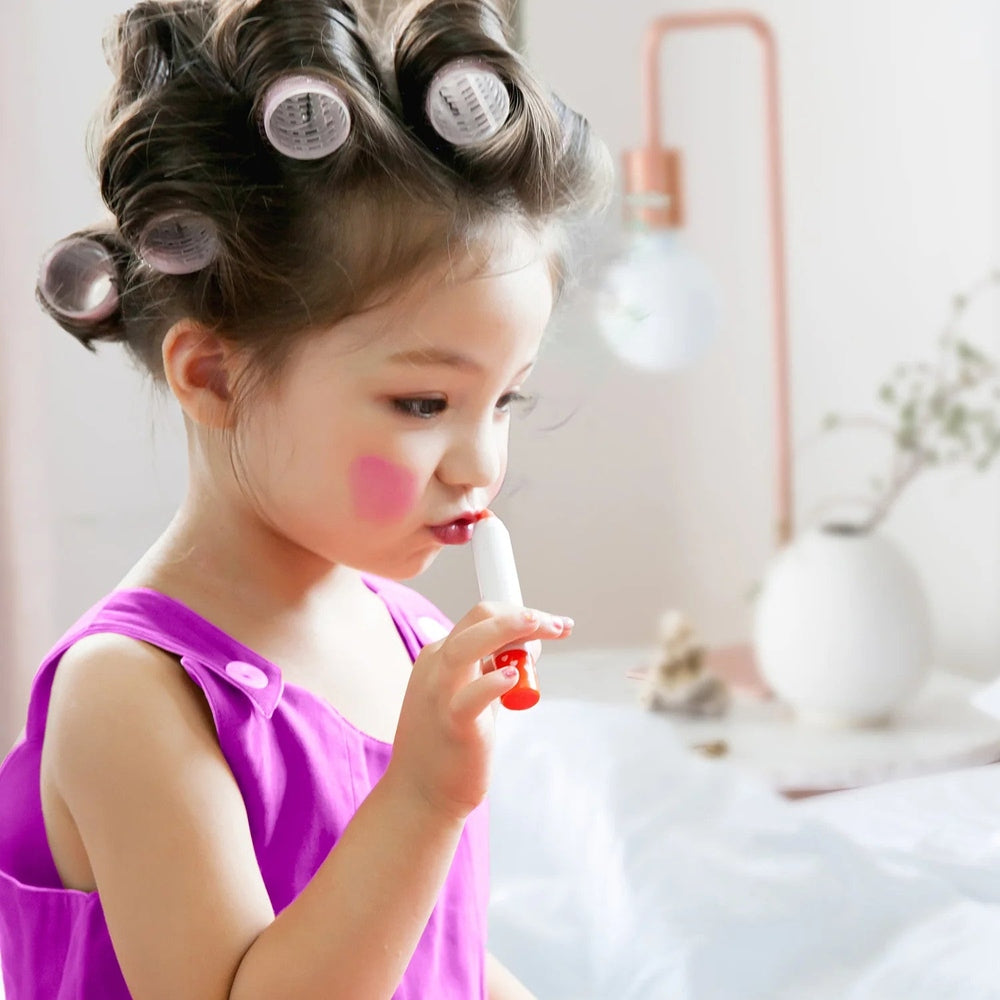 Puttisu Butter Lip Crayon #03 Pink Lemonade for kids, pink lip color being applied