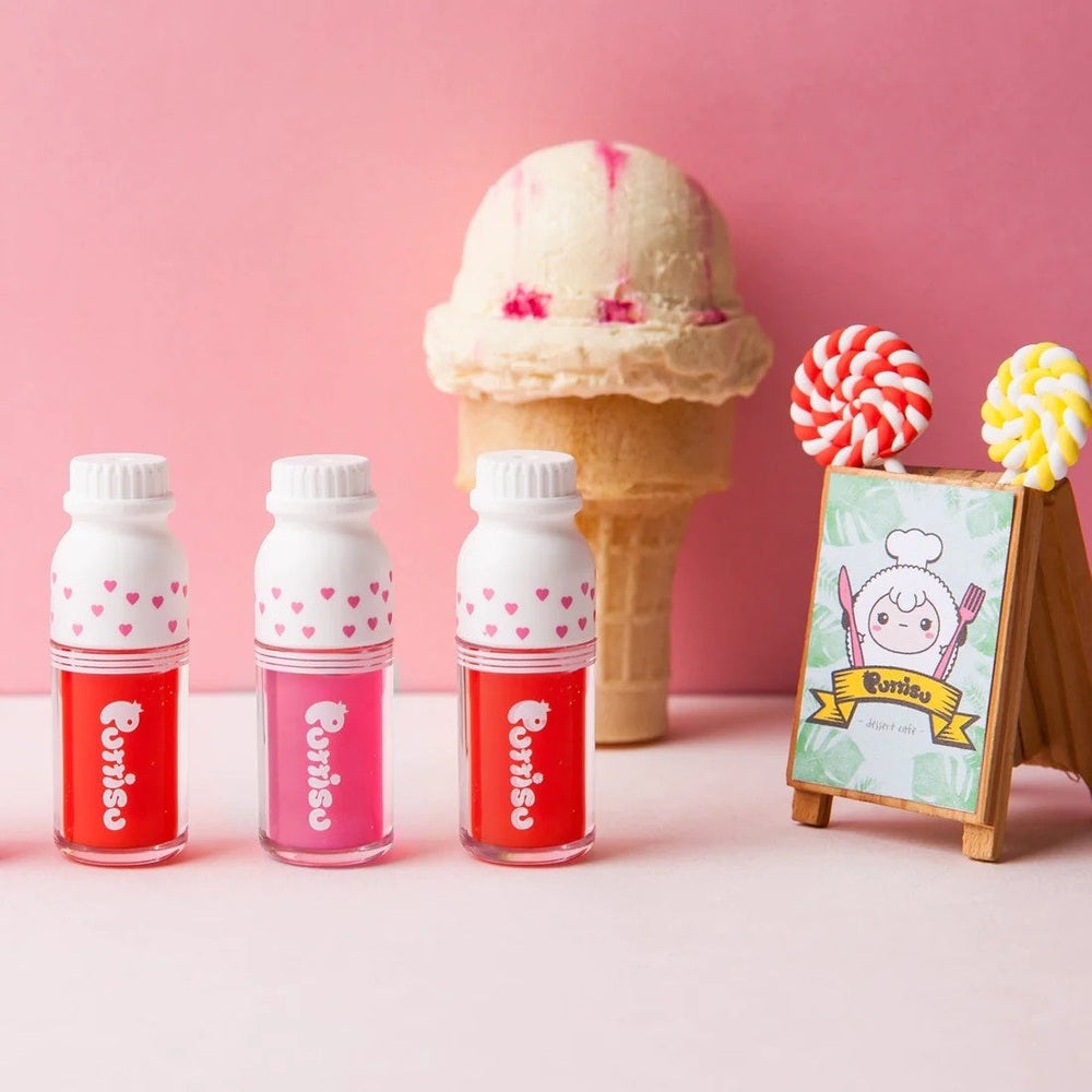 PUTTISU Juicy Lip Gloss Set of 3 in Red Ruby shades with white caps featuring pink heart pattern