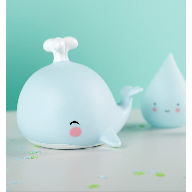 Qhouse Kids A Little Lovely Company Little Light-Blue Whale night light set with two smiling whales casting soft ambient glow.
