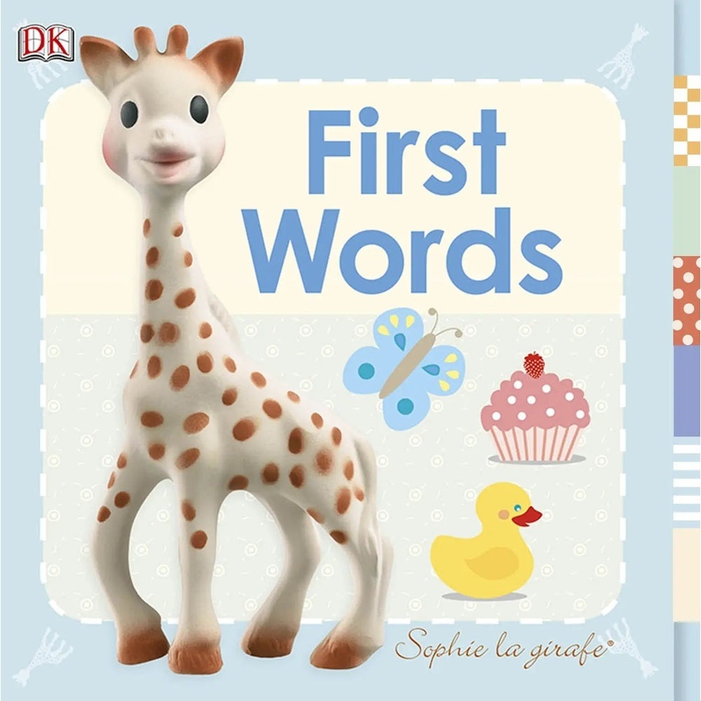 Qhouse Kids Sophie la Girafe Book First Words with a standing giraffe figurine beside pastel butterfly and cupcake art