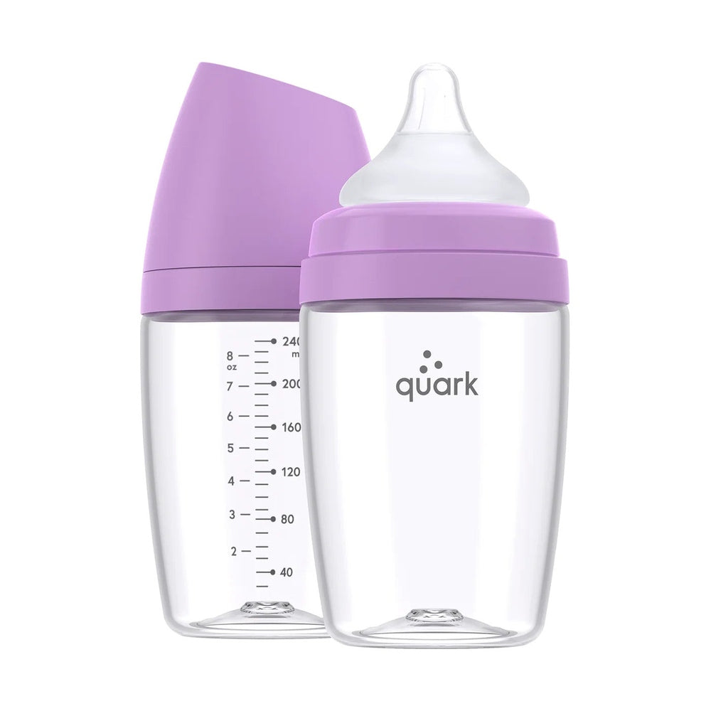 Quark Buubibottle Max Hybrid Feeding Bottle 2-pack with lilac lids; clear bottles show measurement marks and attached nipple.