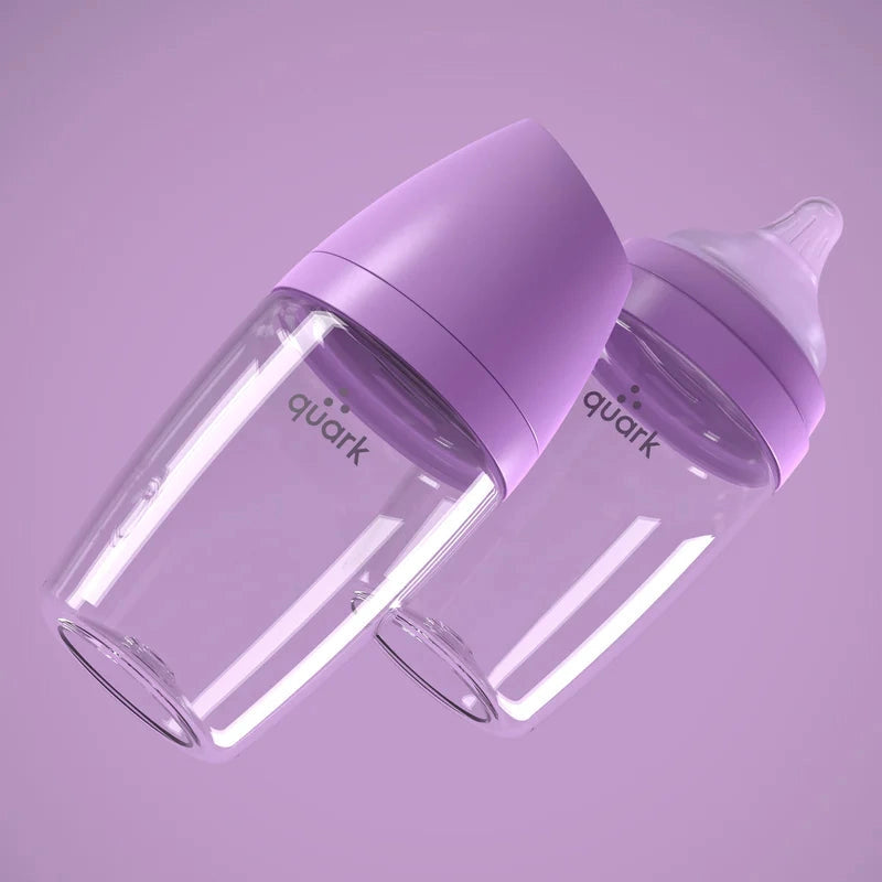 Quark Buubibottle Max Hybrid Feeding Bottle 2-pack, clear baby bottles with purple caps, one nipple attached.