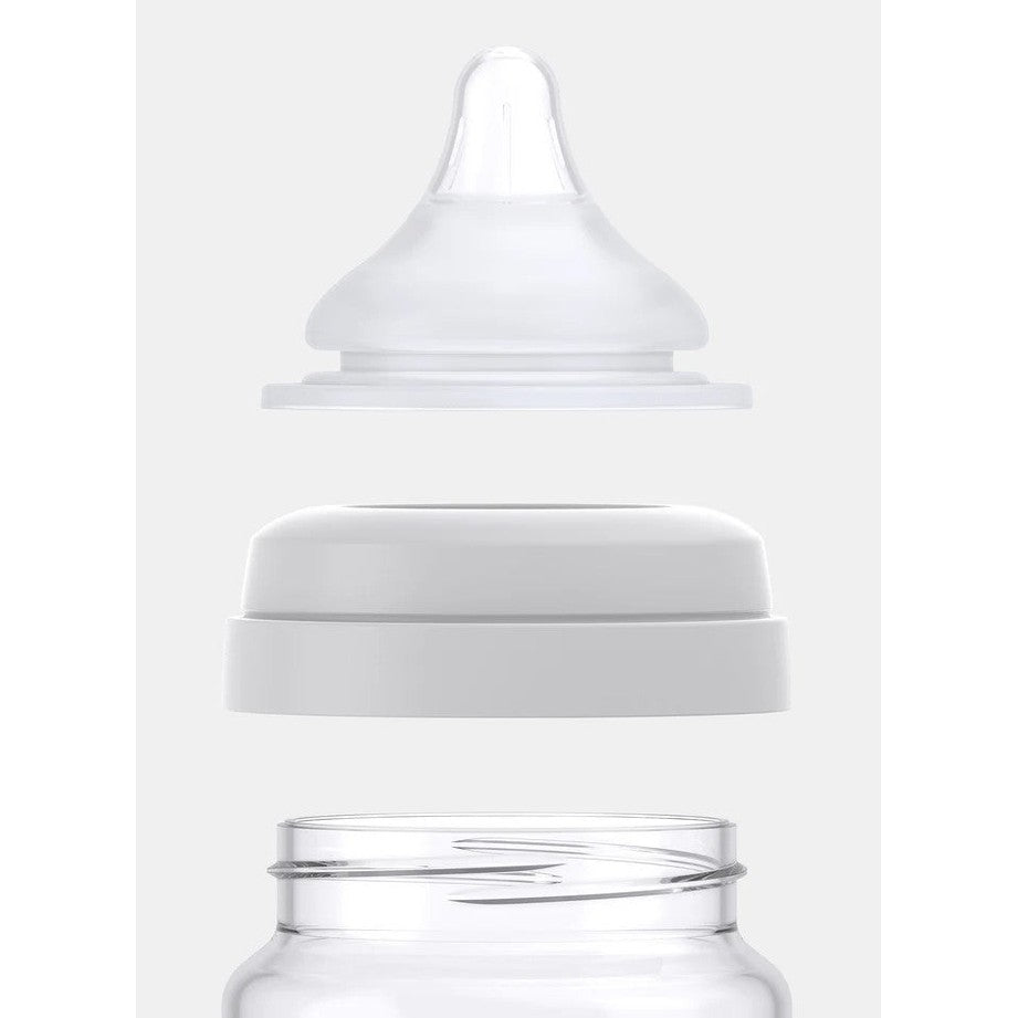 Quark Buubibottle Realfeel bottle nipples set; clear silicone nipple fits a white base cap, shown separated for assembly.