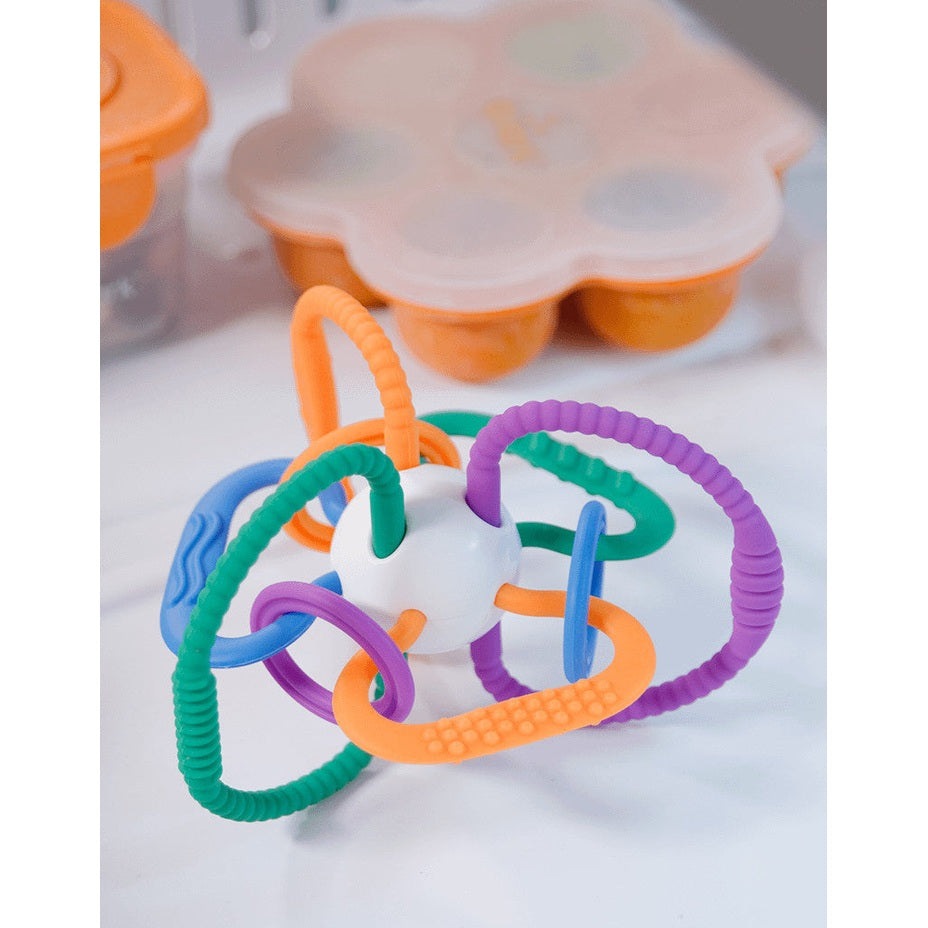 Quark Thiingy Sensory Teething Ball with colorful textured silicone rings for baby teething relief