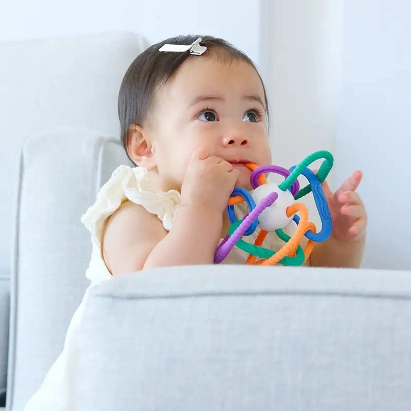 Quark Thiingy Sensory Teething Ball with bright multicolor interlocking rings for babies