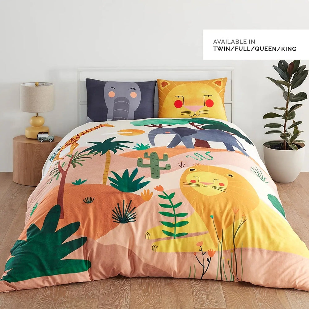 Rookie Humans Kids Bedding Set in the Savanna, vibrant animal-print on a bed with lion and elephant face pillows.