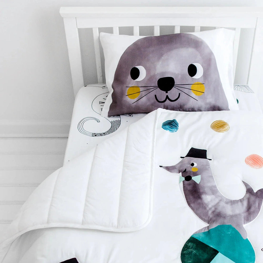 Rookie Humans toddler pillowcases 2-pack featuring a gray seal face on white bedding with underwater love theme