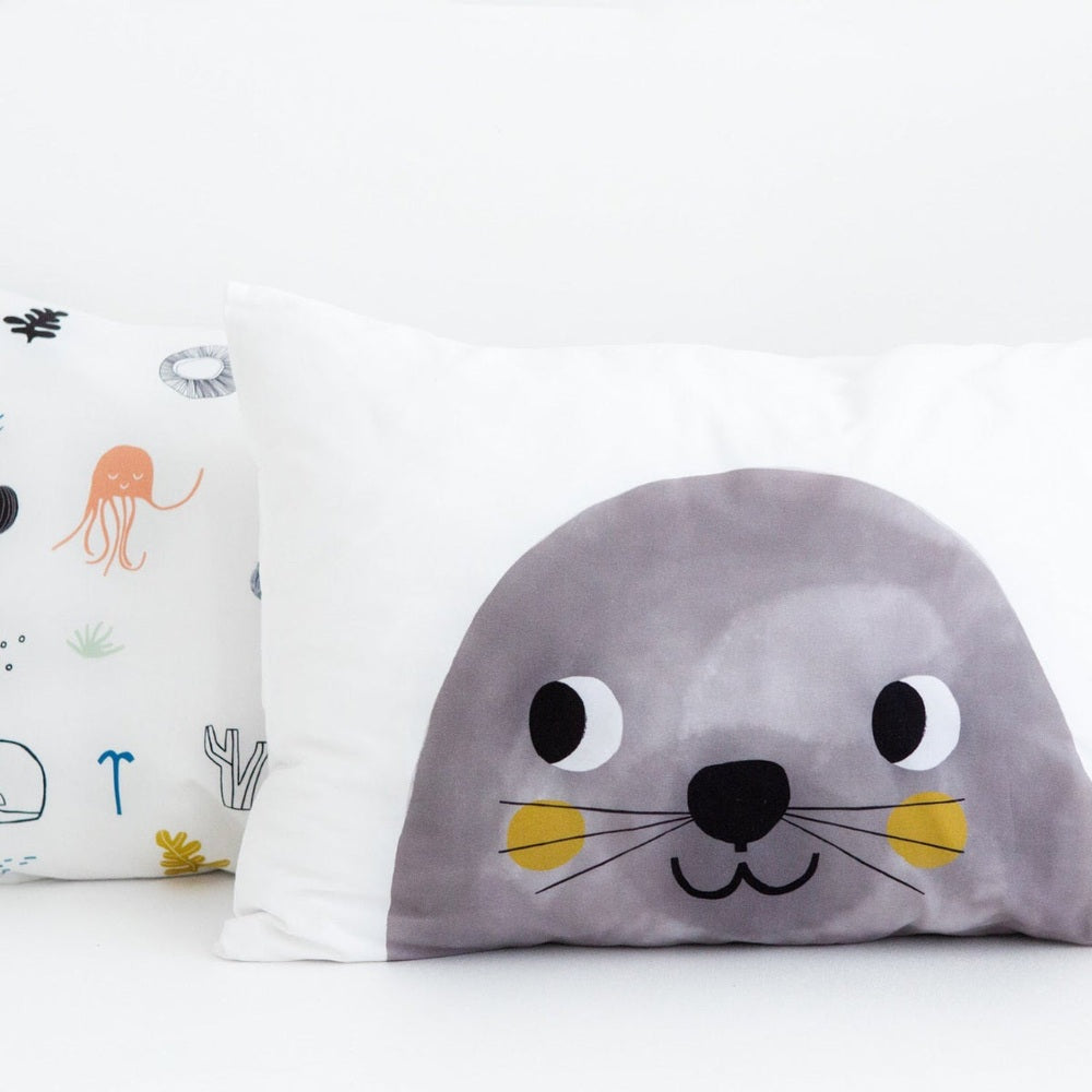 Rookie Humans toddler pillowcase 2-pack, underwater love design featuring a gray seal face on white
