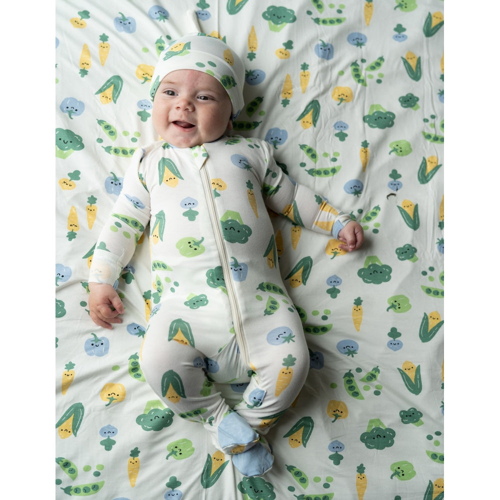 Silkberry Baby Bamboo Footies with Two Way Zipper Farmers Market Print worn with matching beanie