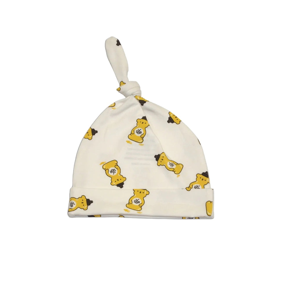 Silkberry Baby knot hat in white organic cotton with yellow honey bear print and knotted top