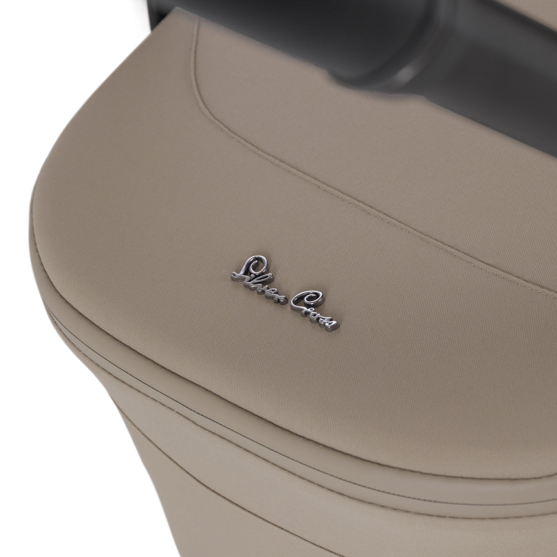 Silver Cross Nia Pod in Champagne — fabric and logo detail