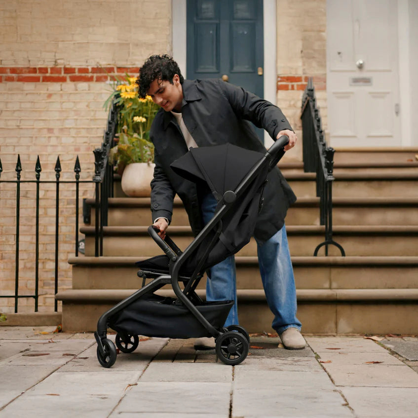 Silver Cross Nia Compact Travel Stroller in Black — city folding demonstration