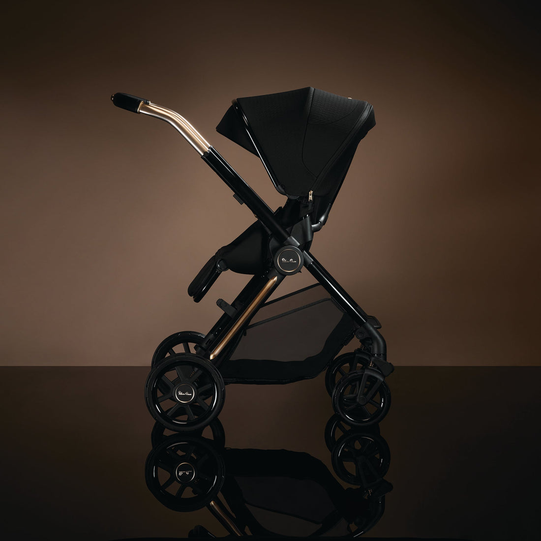 Silver Cross Reef 2 Stroller + Nuna PIPA Bundle — Reef 2 stroller in Espresso world-facing side view