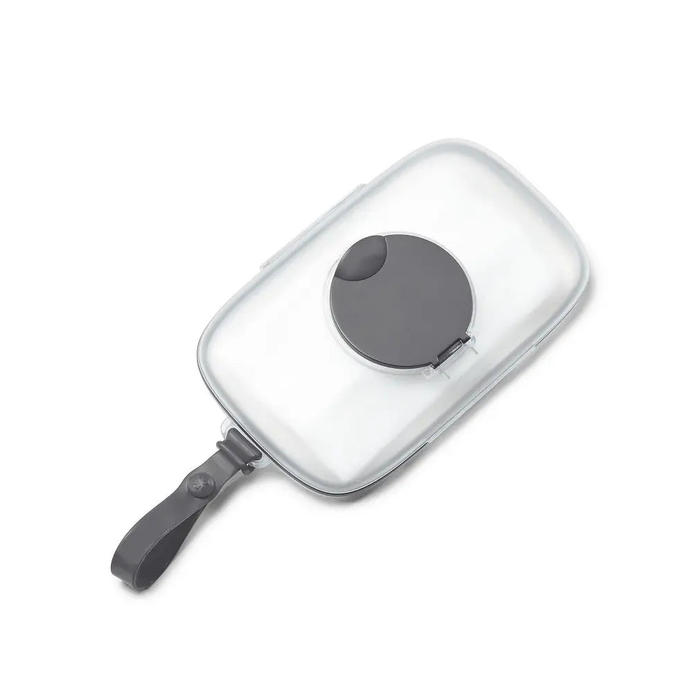 Skip Hop Grab & Go Snug Seal Wipes Case in clear plastic, gray circular seal, and attached strap for portability.