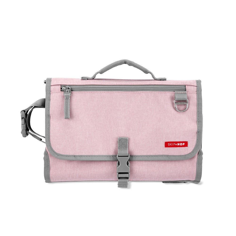 Skip Hop Pronto Signature changing station in pink heather with gray trim and buckle clasp