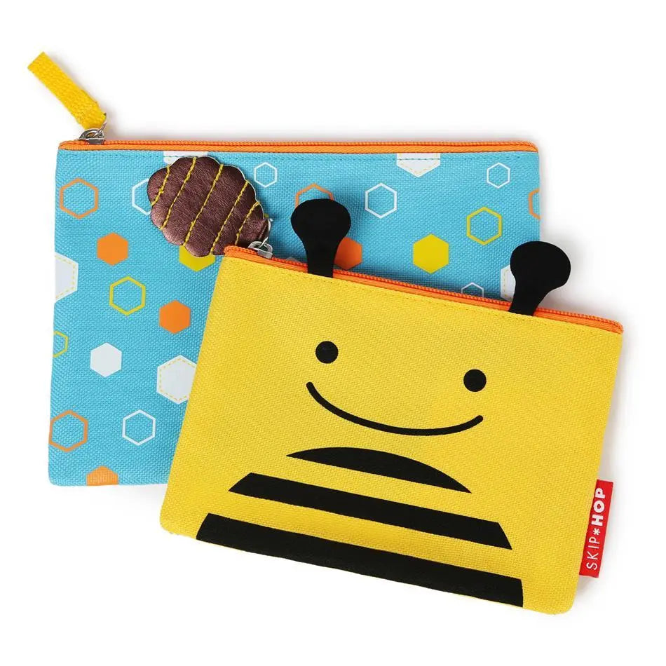Skip Hop Zoo Kid Cases two-pack: yellow bee-face pouch with orange zipper beside blue hexagon-print bag.