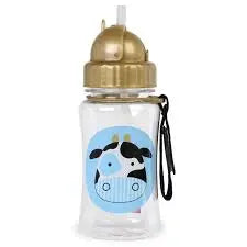 Skip Hop Zoo Straw Bottle, clear body with blue cow graphic and gold cap, carried with strap for on-the-go.