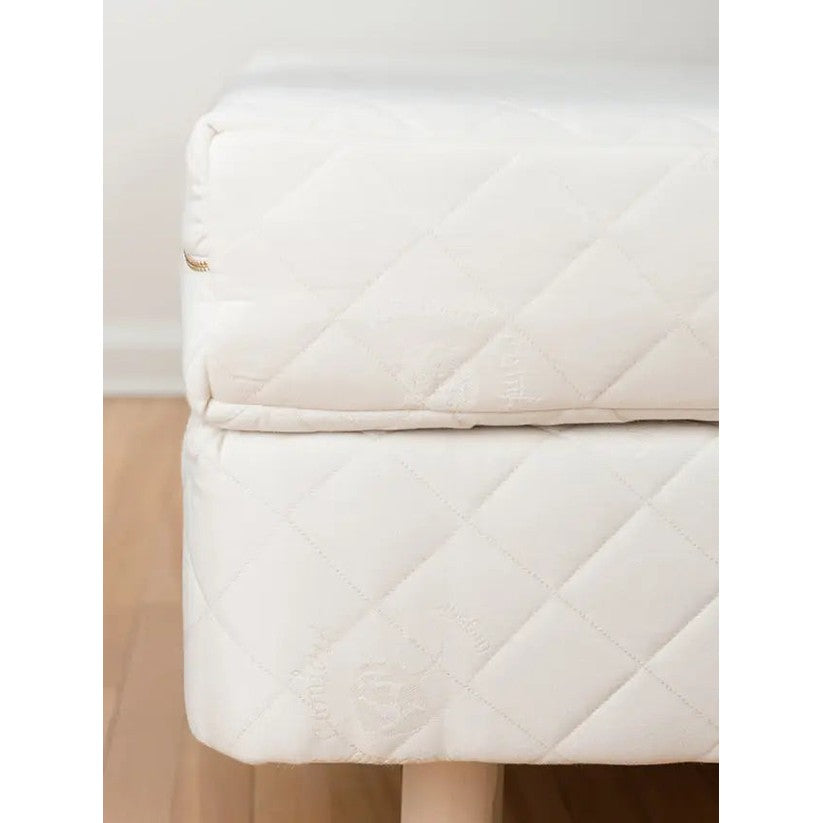 Sleeptek Organic Kids Rubber Mattress in white quilted latex cover, twin size, shown on a wooden floor.