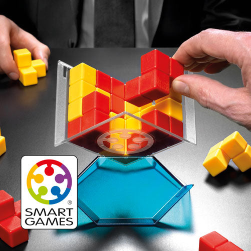 Smart Games Cube Duel educational puzzle with red and yellow blocks and a blue translucent tray; hands arranging pieces