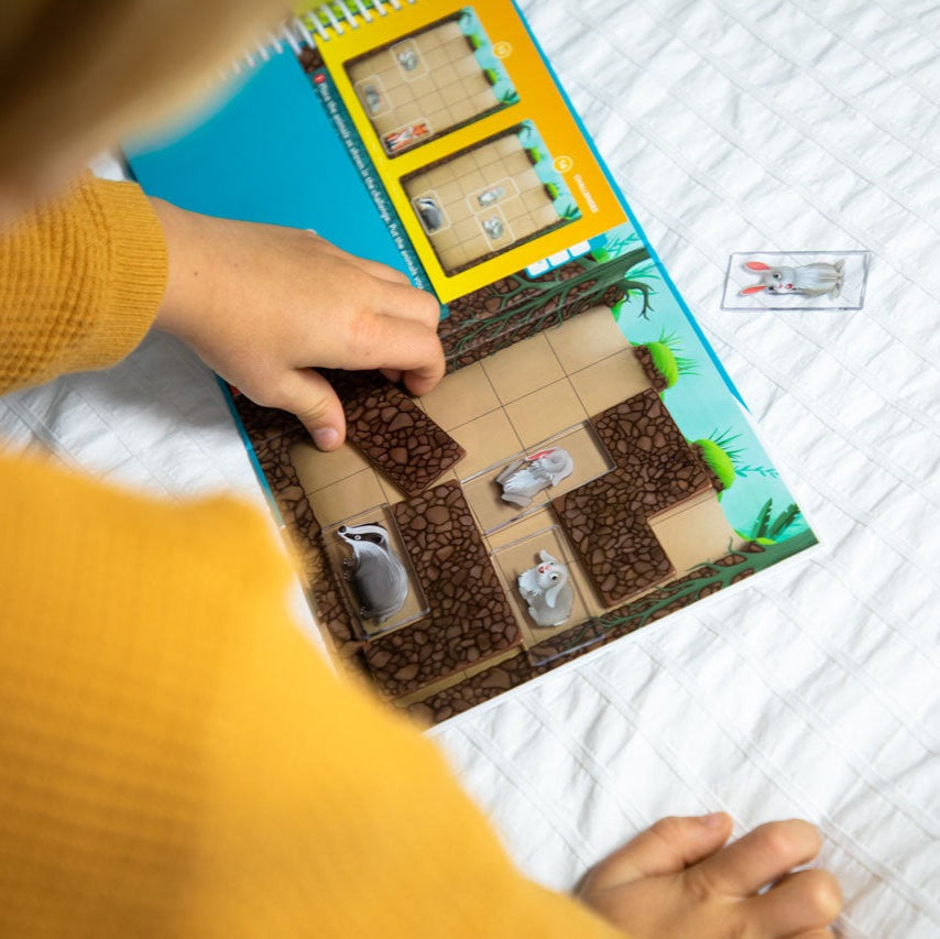 Smart Games Down The Rabbit Hole puzzle game for kids, brown brick tunnel tiles with animal figures