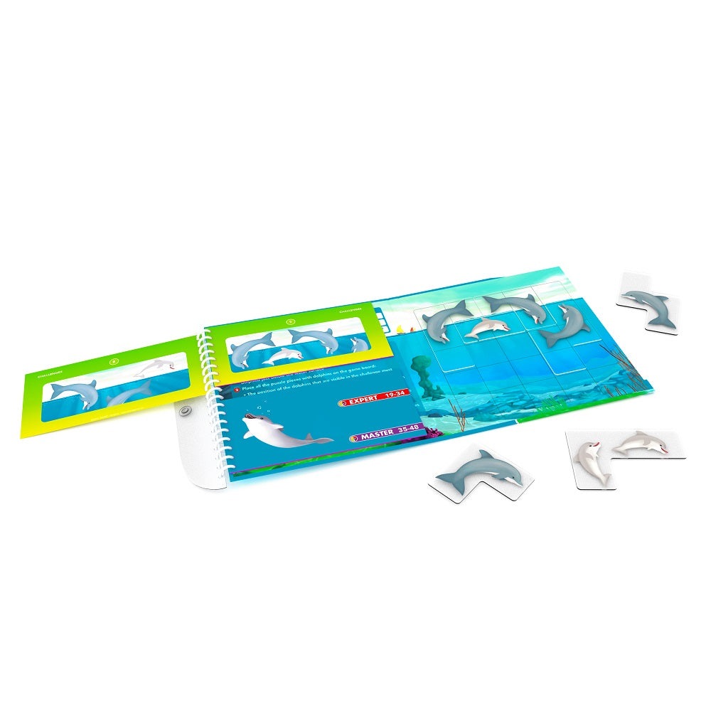 Smart Games Flippin' Dolphins puzzle book with dolphin tiles on a blue grid - educational toy by SMART GAMES