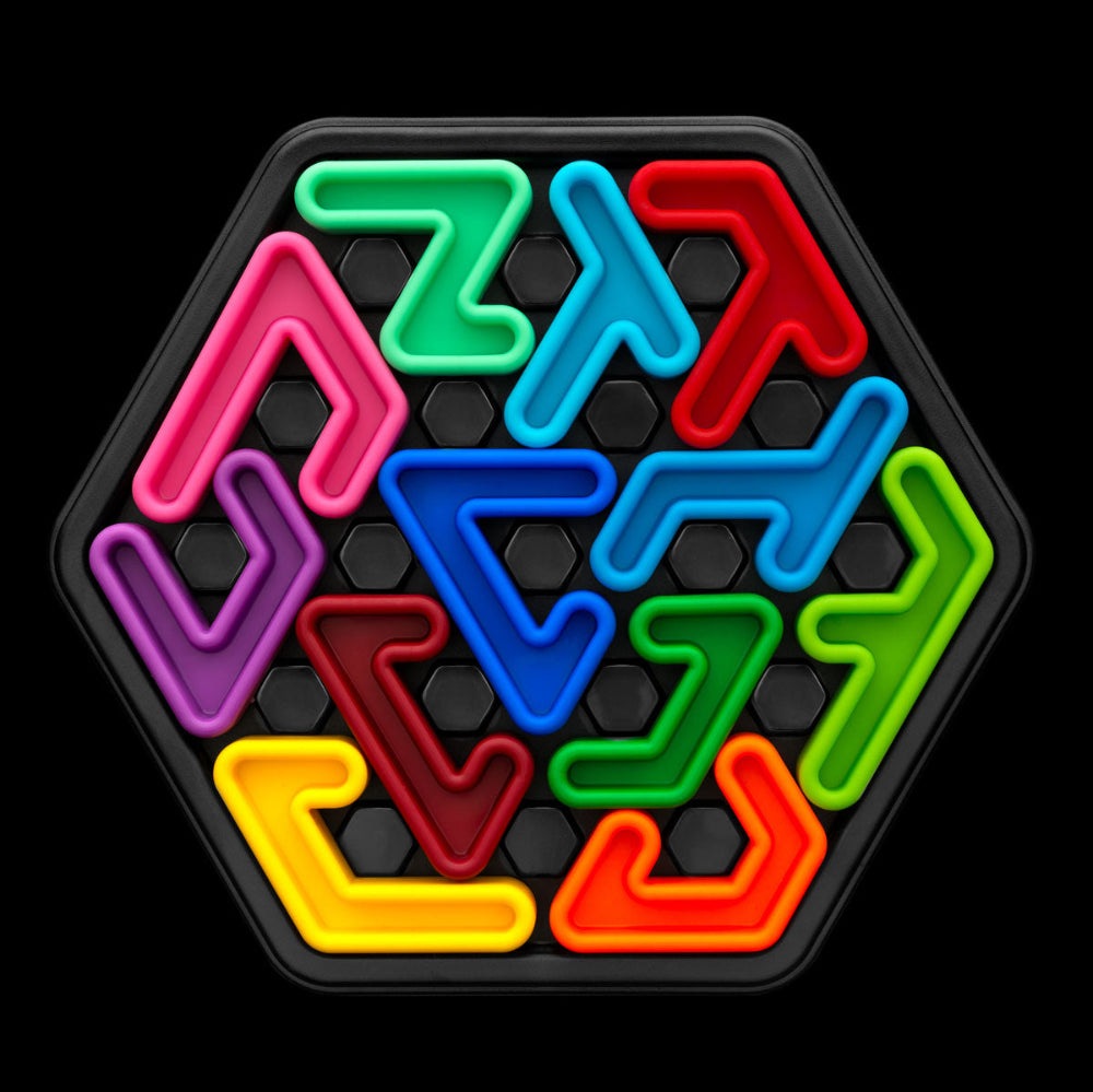 Smart Games IQ Deluxe Hexagon puzzle toy with bright multicolor neon arrow pieces on a hexagonal grid