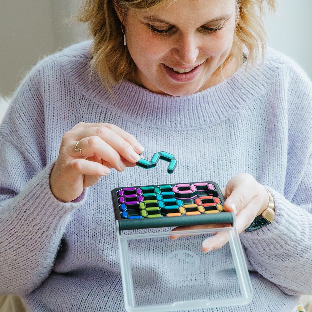 IQ Digits puzzle by SMART GAMES with colorful magnetic tiles on a portable board