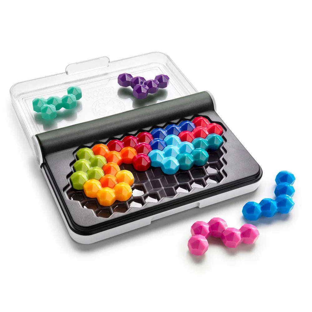 Smart Games IQ Six Pro puzzle set with colorful hexagonal pieces and a black storage case