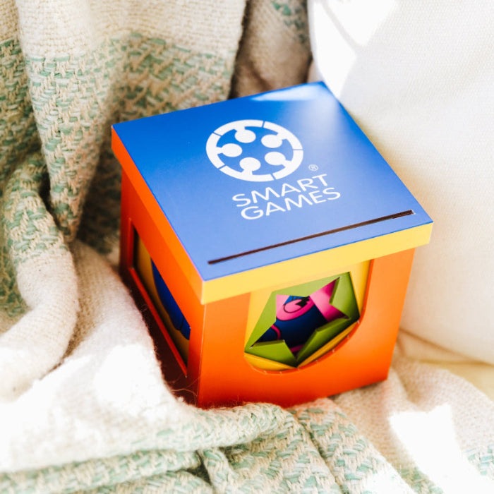 Smart Games Peek-A-Zoo puzzle cube toy, orange body with blue lid and multicolor interior.