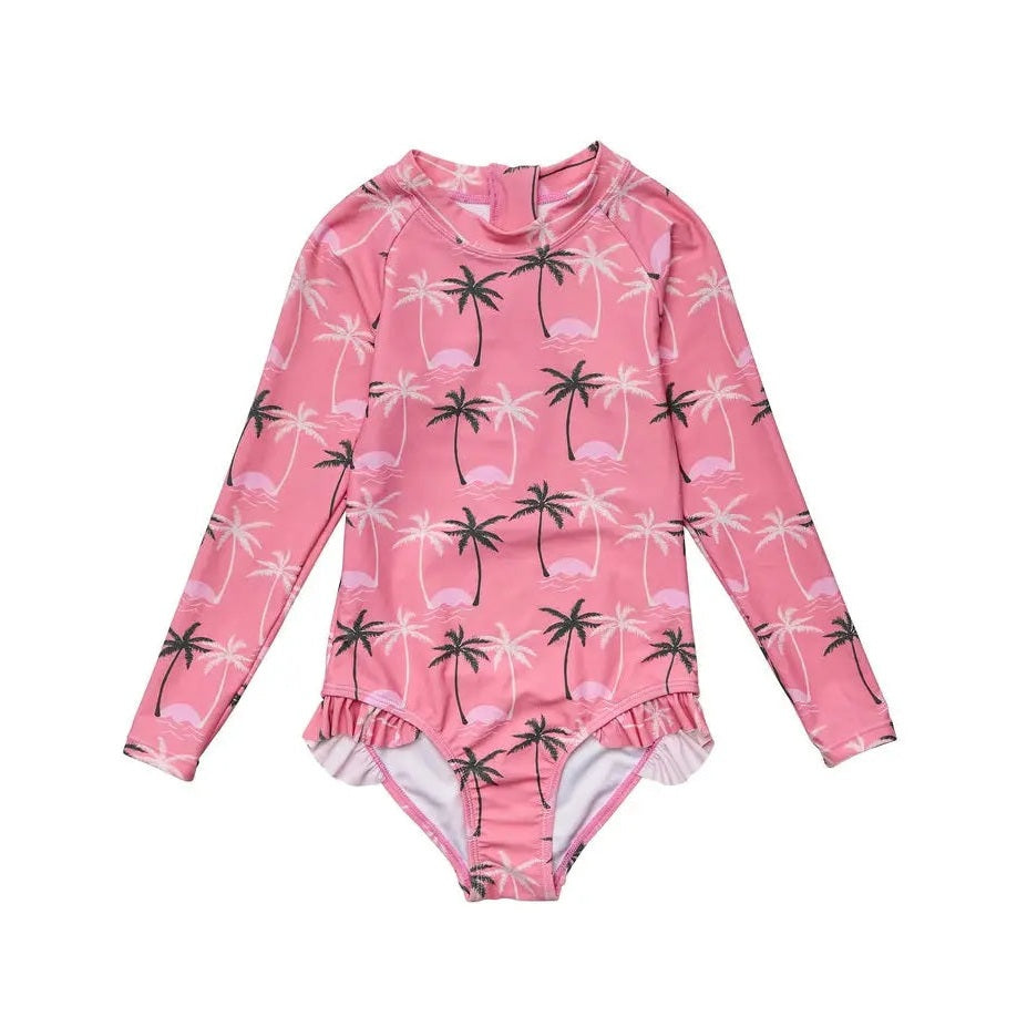 Snapper Rock Palm Paradise Surf Suit pink long-sleeve baby one-piece with palm tree print and ruffled leg openings.