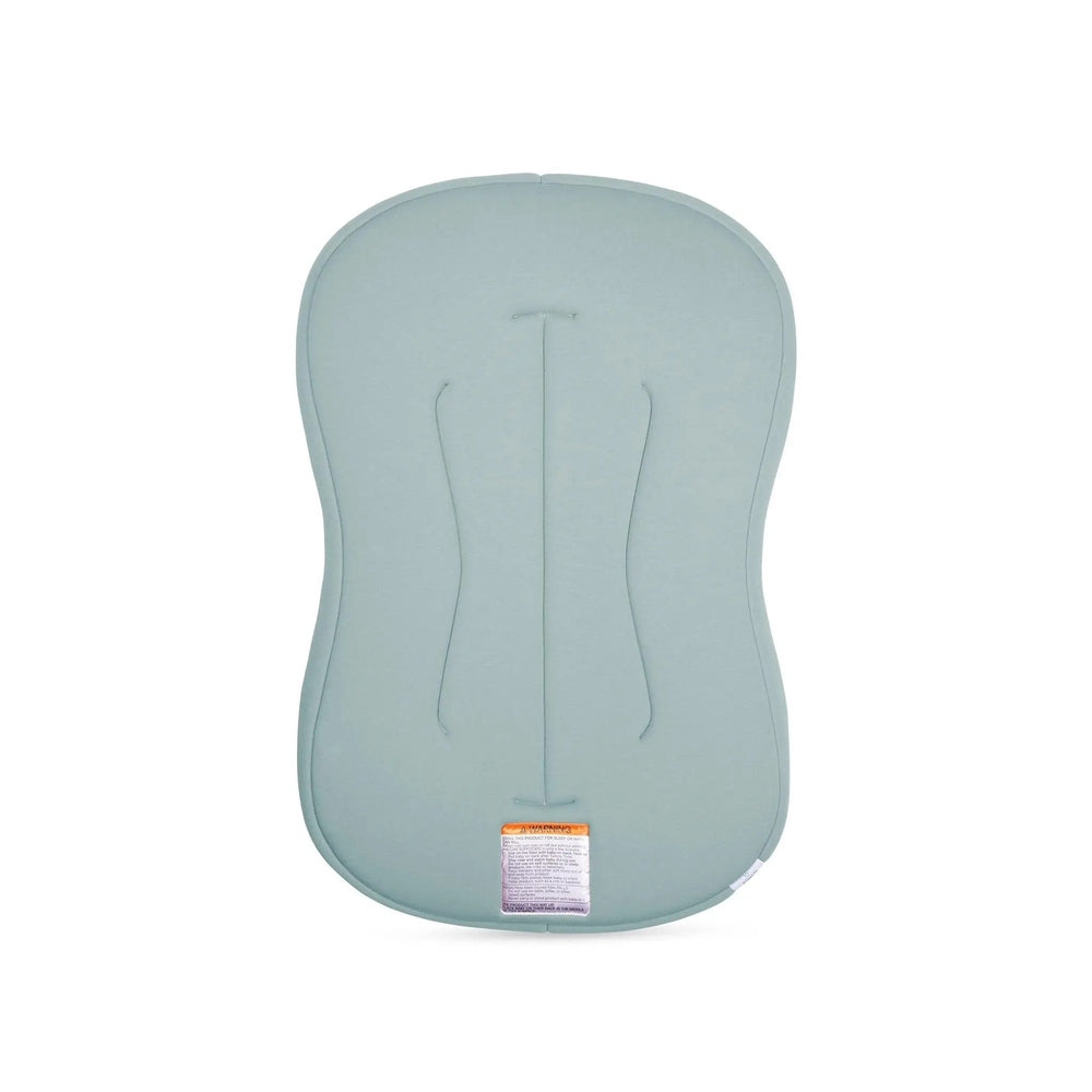 Snuggle Me Organic Lounger Curve nursing pillow in light blue, with contoured sides for gentle support.