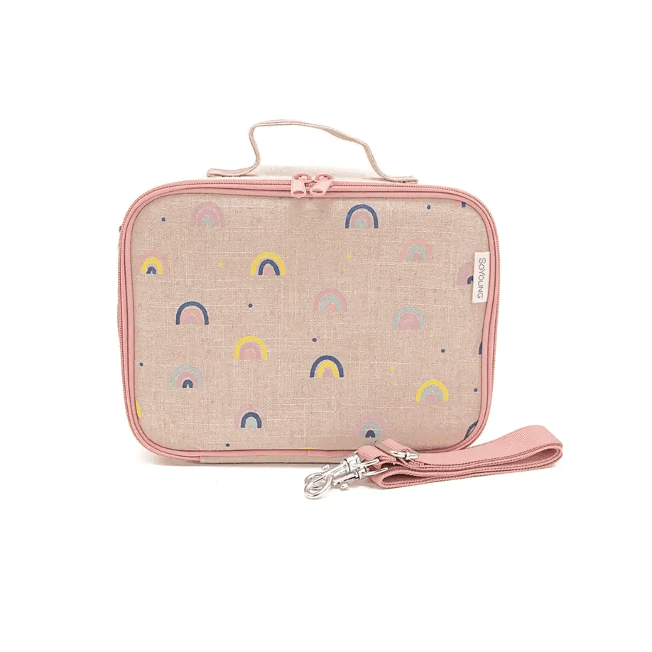 So Young Lunch Box in beige fabric with pastel rainbow print and pink trim; detachable strap laid beside for carrying.