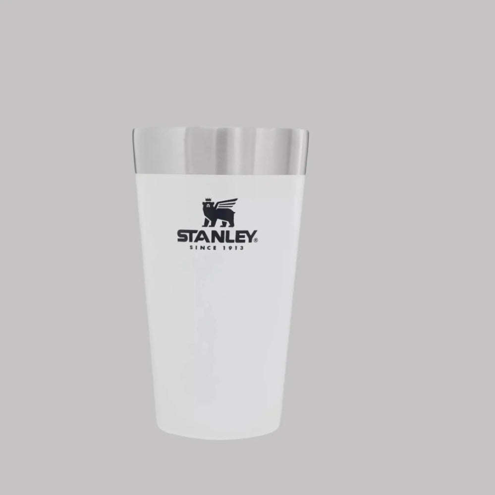 Stanley Adventure Stacking Beer Pint 16 oz tumbler, white with silver rim, logo visible as it stands upright.