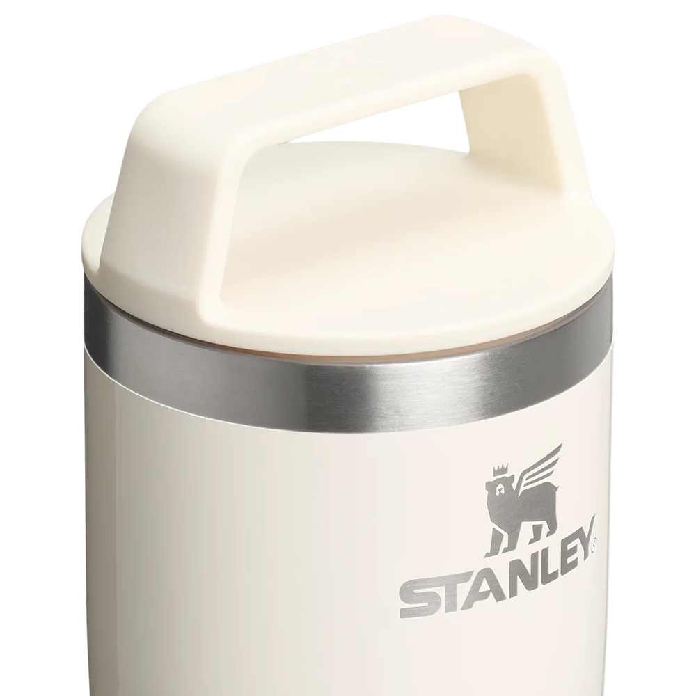 Stanley Cafe-To-Go Travel Mug 16 oz, white with stainless band; sturdy top handle for easy carrying.