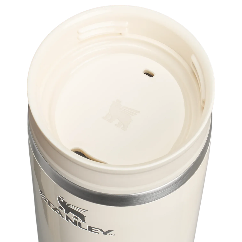 Stanley Cafe-To-Go Travel Mug 16 oz in stainless steel with cream lid open, showing the sip hole for easy sipping.