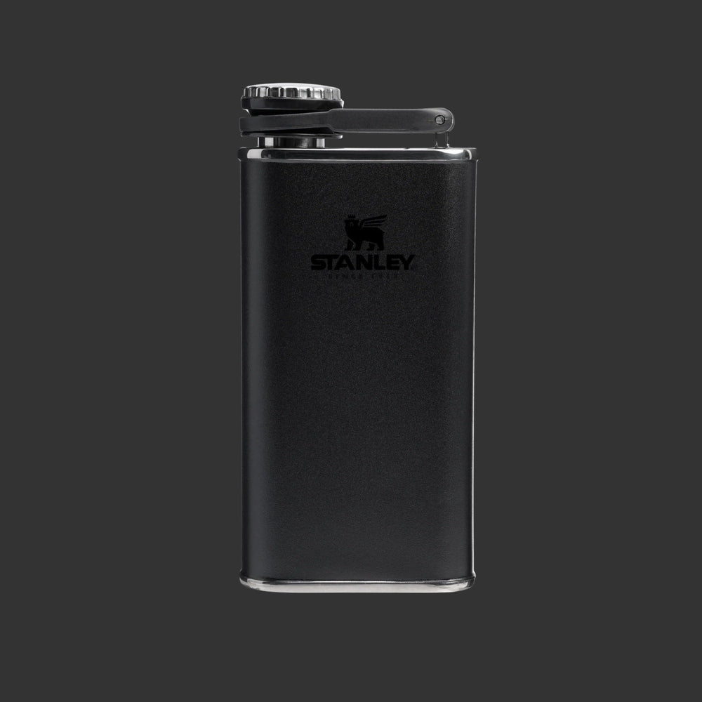 Stanley Classic Flask 8oz in black matte finish with hinged cap secured atop, standing upright.