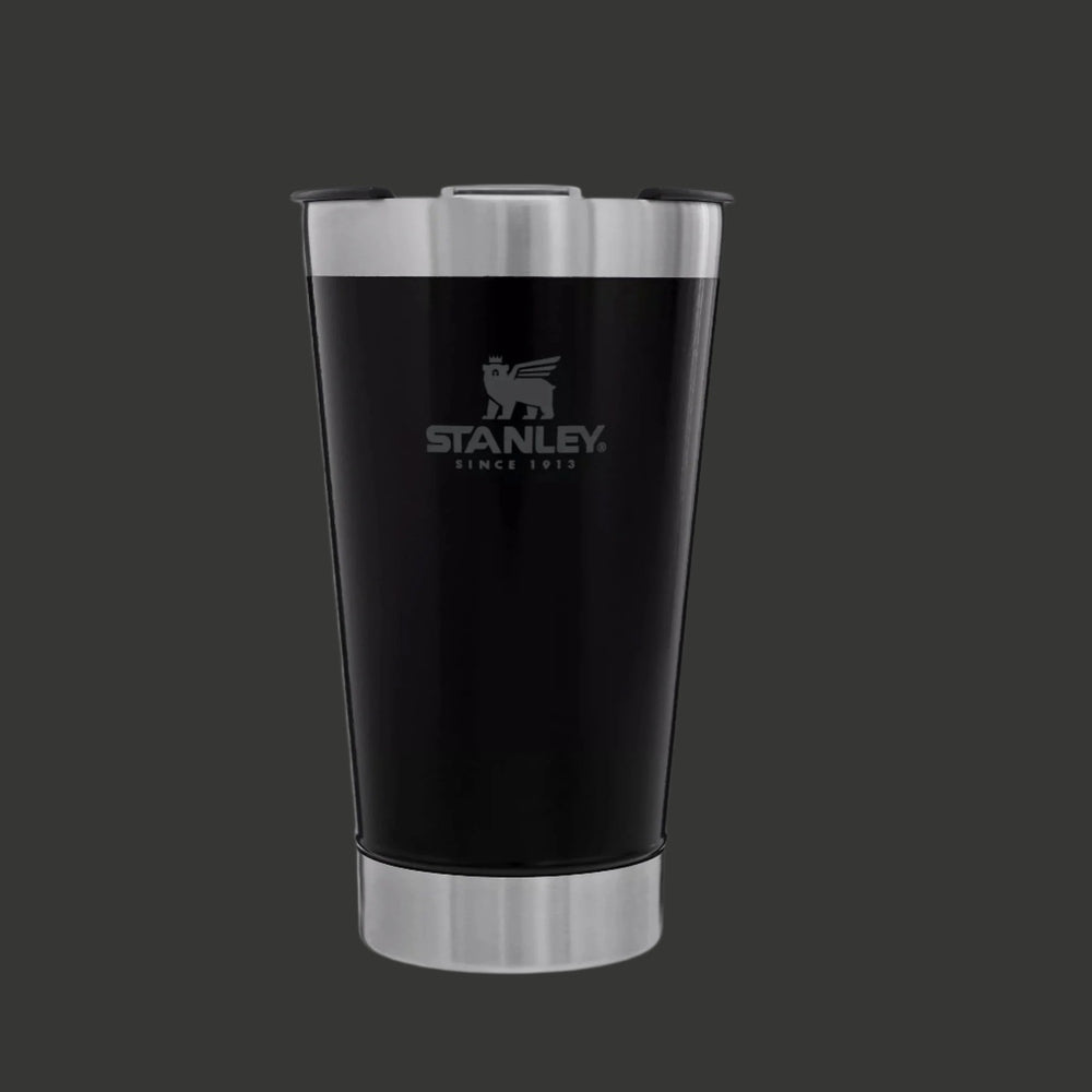 Stanley Classic Stay Chill Beer Pint 16 oz tumbler in black with silver lid and base, STANLEY logo visible.