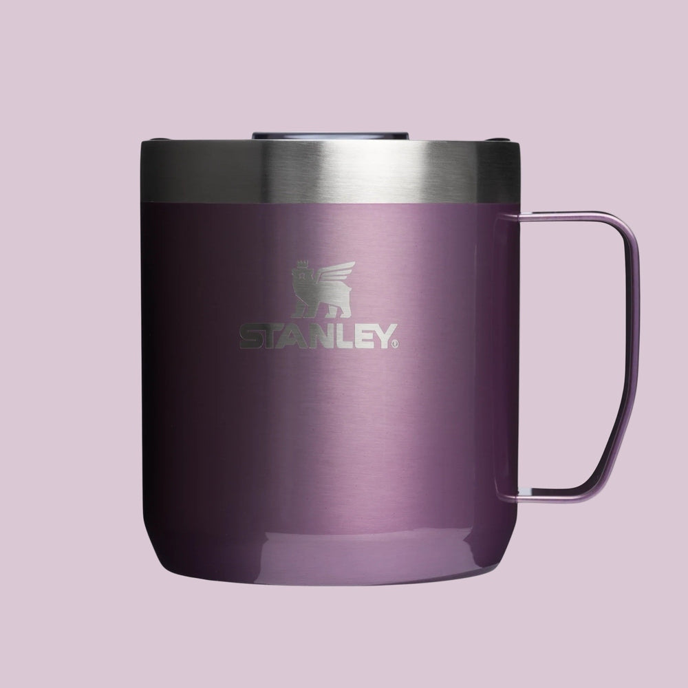 Stanley Classic Stay-Hot Camp Mug 12 oz in purple stainless steel with silver lid, standing upright.