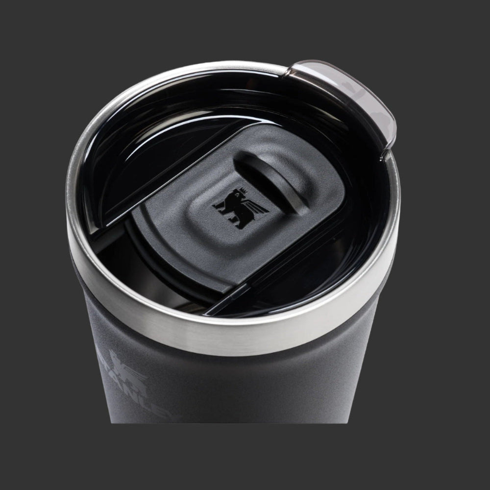 Stanley Everyday Tumbler 16oz in gray with open spill-proof lid, ready for sipping.