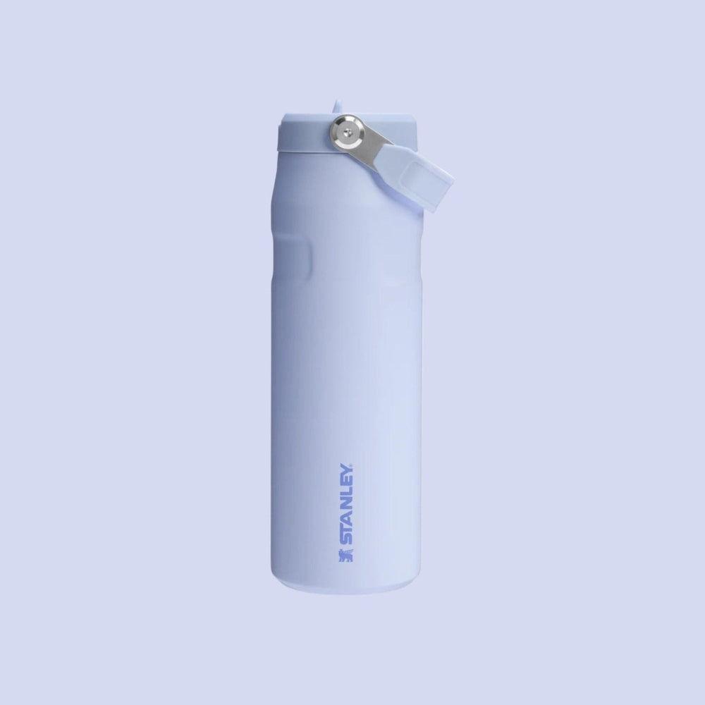 Stanley Iceflow Aerolight Flip Straw Vacuum Water Bottle 24oz in light blue, flip lid open for easy sipping.