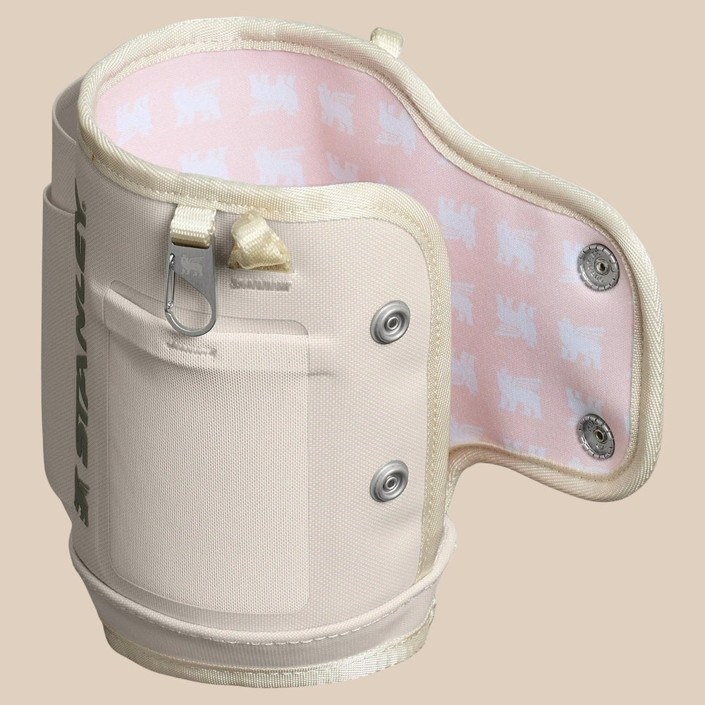 Stanley All Day Quencher Carry-All 30 oz insulated bottle carrier in beige with pink lining