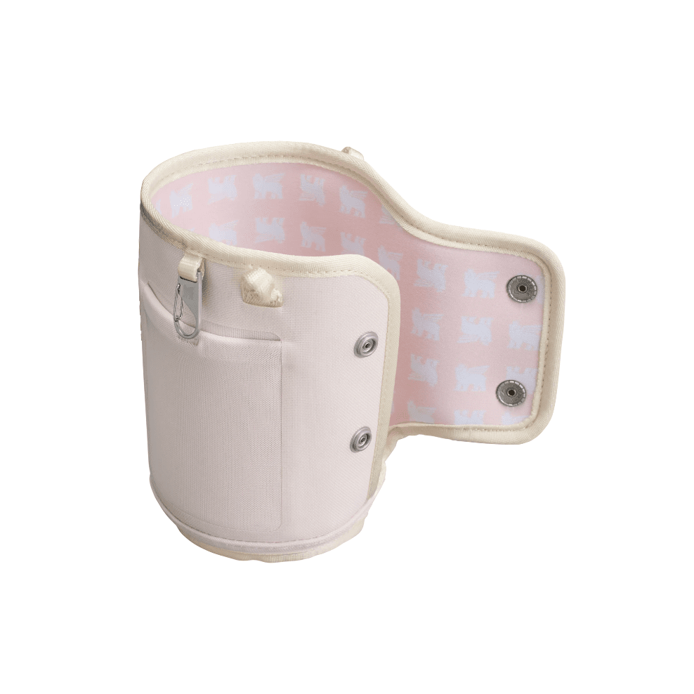 Stanley All Day Quencher Carry-All 40 oz bottle carrier in soft pink exterior with pink patterned interior