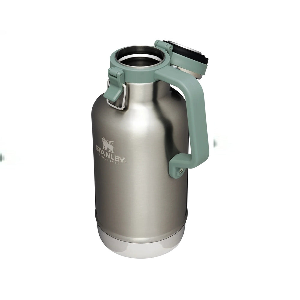 STANLEY The Easy-Pour Growler 64 oz with mint-green handle shown ready to pour from stainless steel bottle.