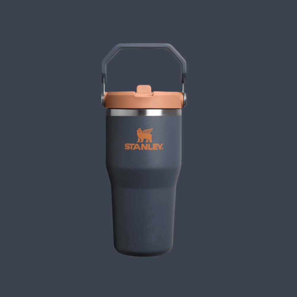 Stanley IceFlow Flip Straw 2.0 20 oz tumbler in navy with copper lid and built-in handle