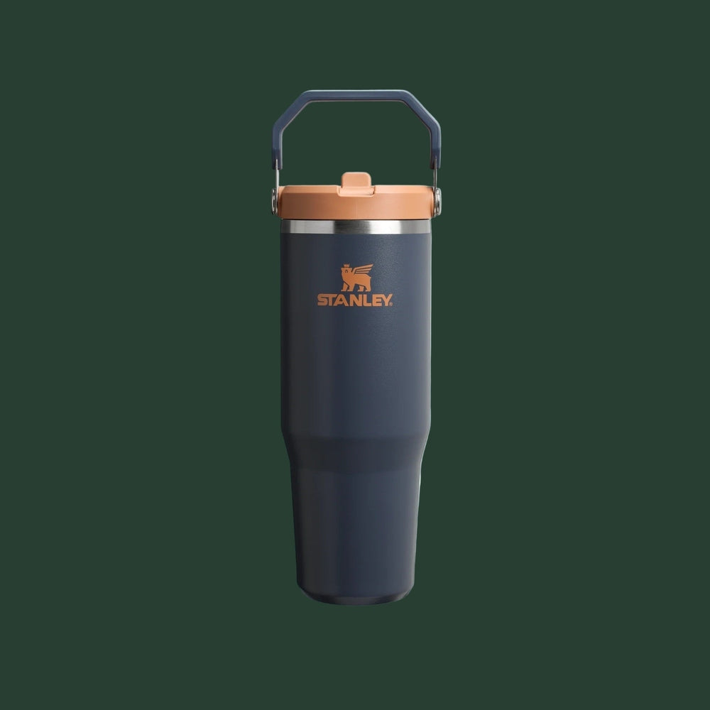 Stanley The Iceflow Flip Straw 2.0 Tumbler 30 oz in navy with orange lid and sturdy carry handle