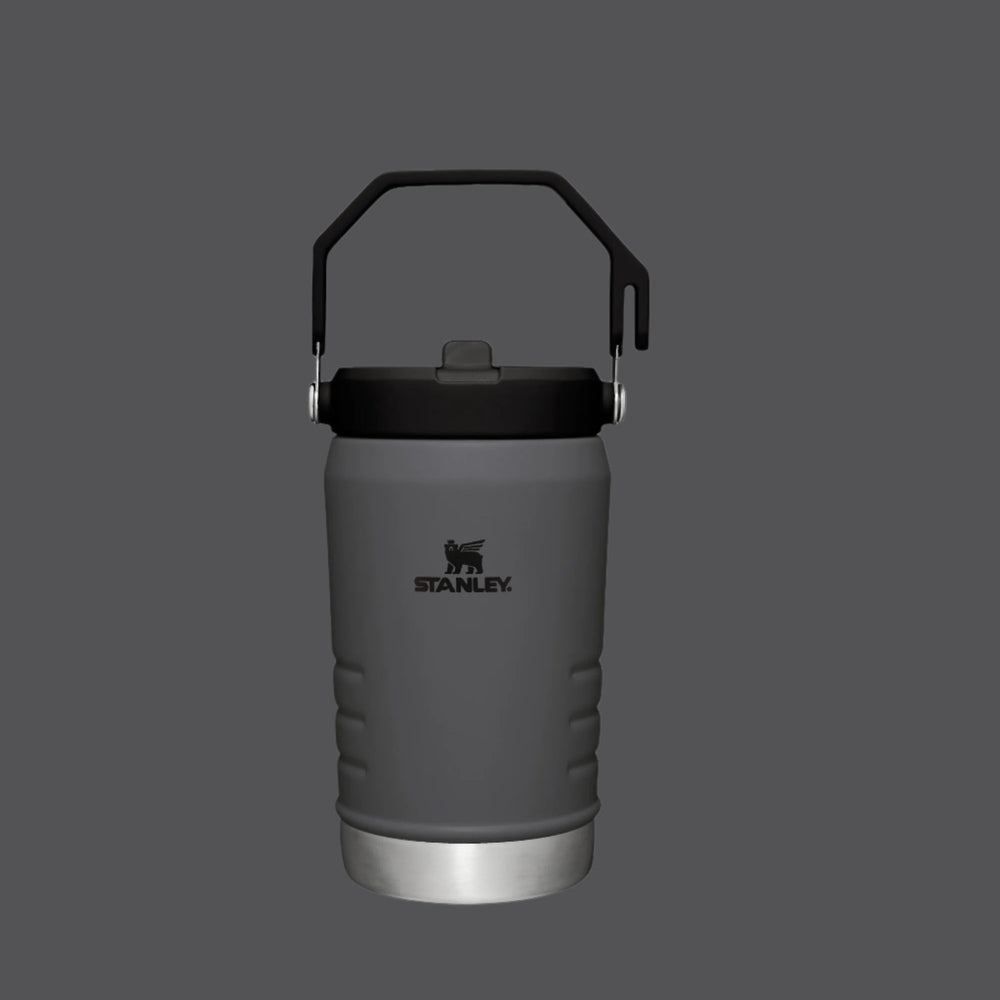 Stanley The Iceflow Flip Straw Jug 40 oz gray insulated bottle with a black carry handle for on-the-go hydration.